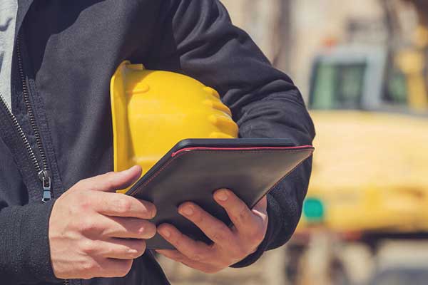 How can construction management software improve productivity